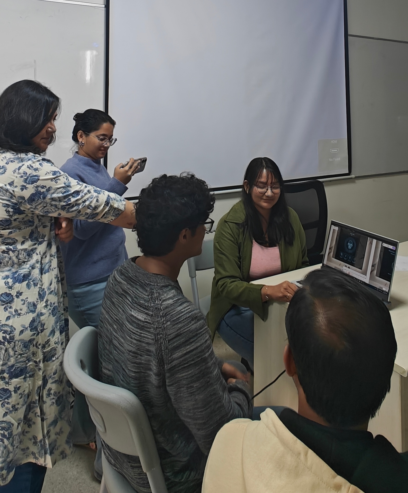 Amruta Ranade teaching and mentoring in the classroom studio